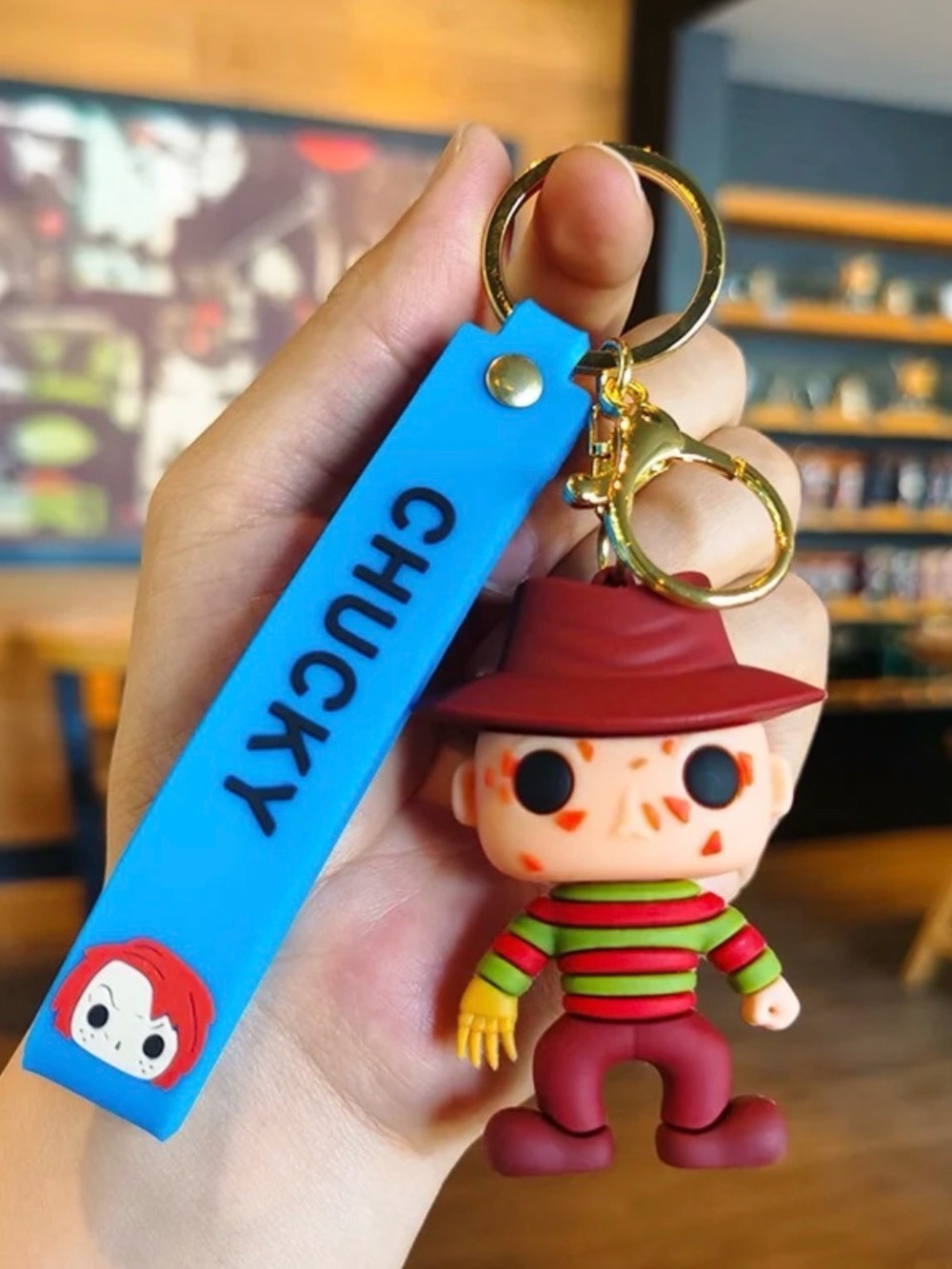 Blue Strap Freddy-Inspired Horror Keychain with Red Hat Figure